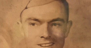 A young Capt. Verheul smiling for a portrait.