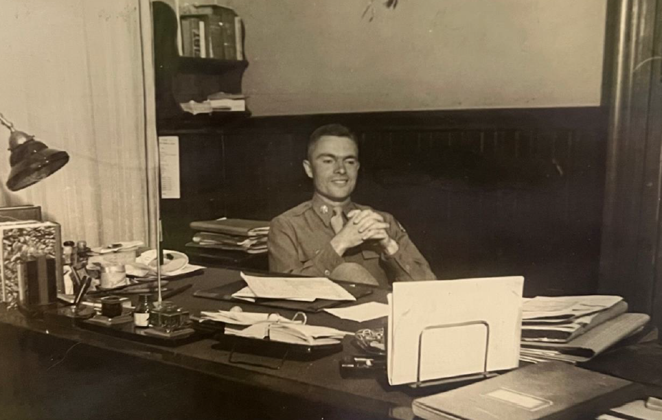 Maj. Verheul in his office completing paperwork