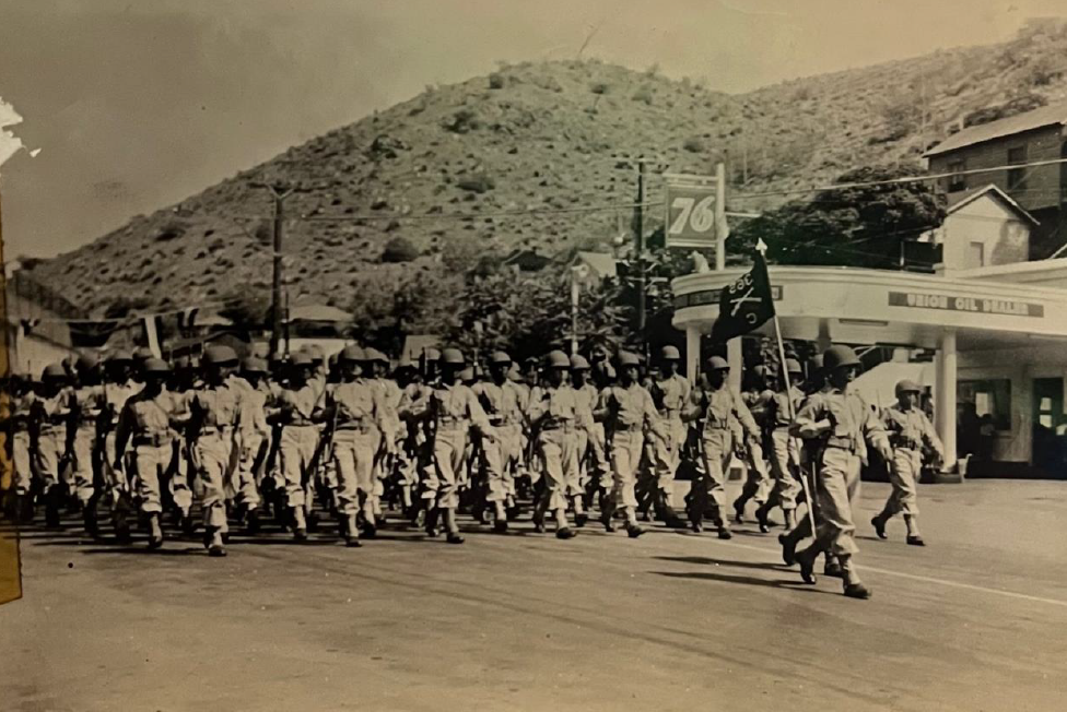 Capt. Verheul is seen leading Company C, 365th Infantry Regiment